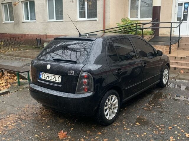 Черный Шкода Фабия, объемом двигателя 1.4 л и пробегом 210 тыс. км за 1600 $, фото 1 на Automoto.ua