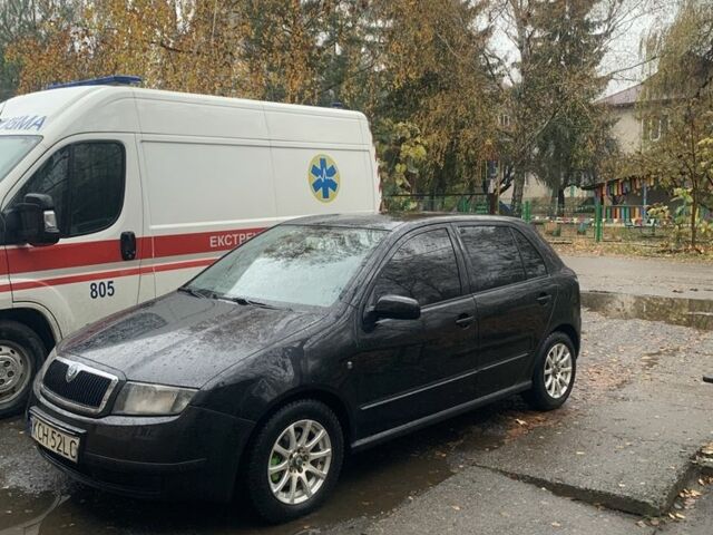 Черный Шкода Фабия, объемом двигателя 1.4 л и пробегом 210 тыс. км за 1600 $, фото 3 на Automoto.ua