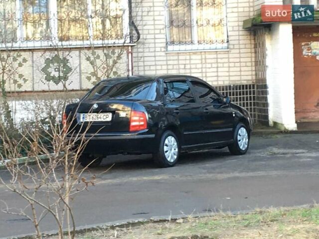 Черный Шкода Фабия, объемом двигателя 1.4 л и пробегом 203 тыс. км за 4100 $, фото 9 на Automoto.ua