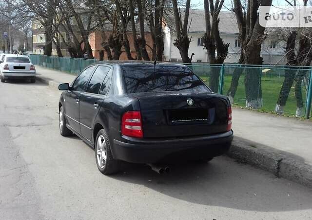 Чорний Шкода Фабія, об'ємом двигуна 1.4 л та пробігом 226 тис. км за 3600 $, фото 13 на Automoto.ua