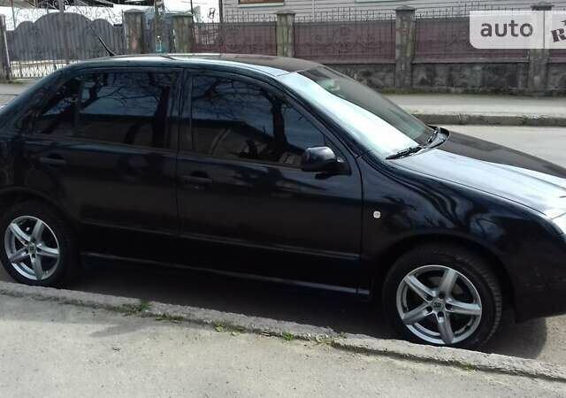 Чорний Шкода Фабія, об'ємом двигуна 1.4 л та пробігом 226 тис. км за 3600 $, фото 15 на Automoto.ua