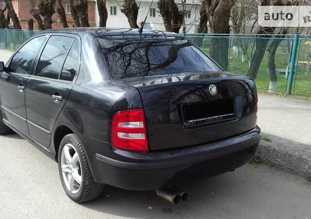 Чорний Шкода Фабія, об'ємом двигуна 1.4 л та пробігом 226 тис. км за 3600 $, фото 8 на Automoto.ua