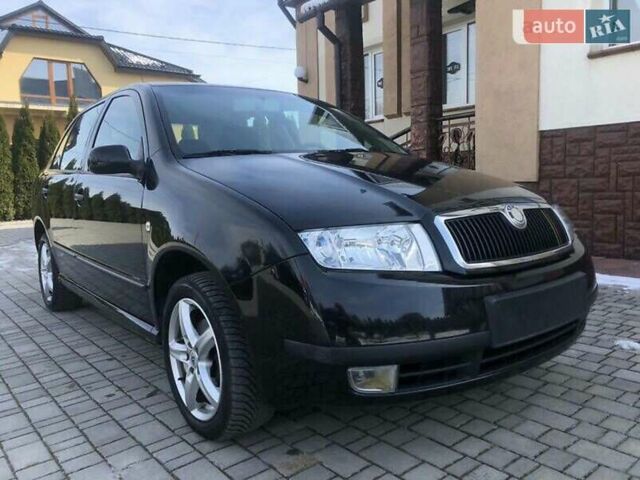 Чорний Шкода Фабія, об'ємом двигуна 1.4 л та пробігом 226 тис. км за 3600 $, фото 24 на Automoto.ua