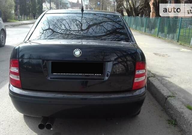 Чорний Шкода Фабія, об'ємом двигуна 1.4 л та пробігом 226 тис. км за 3600 $, фото 16 на Automoto.ua