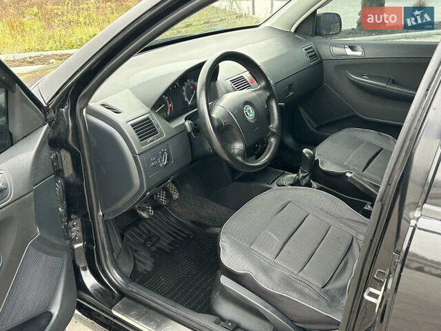 Черный Шкода Фабия, объемом двигателя 1.4 л и пробегом 233 тыс. км за 3750 $, фото 13 на Automoto.ua