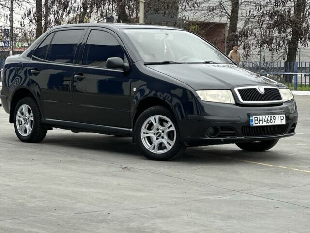 Черный Шкода Фабия, объемом двигателя 1.2 л и пробегом 200 тыс. км за 3100 $, фото 1 на Automoto.ua