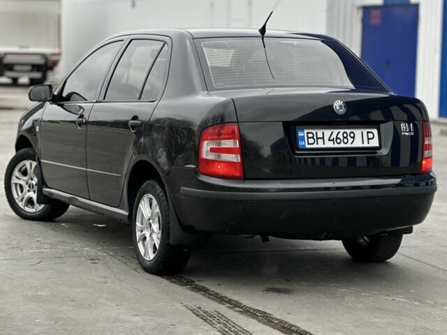 Черный Шкода Фабия, объемом двигателя 1.2 л и пробегом 200 тыс. км за 3100 $, фото 2 на Automoto.ua