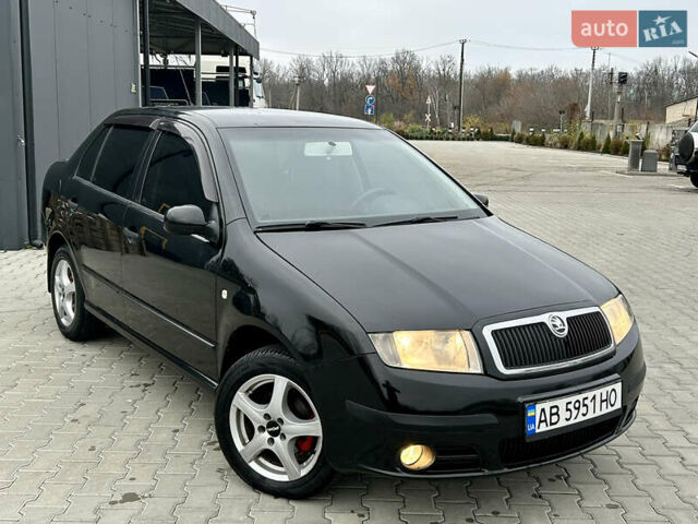 Черный Шкода Фабия, объемом двигателя 1.4 л и пробегом 234 тыс. км за 3700 $, фото 1 на Automoto.ua