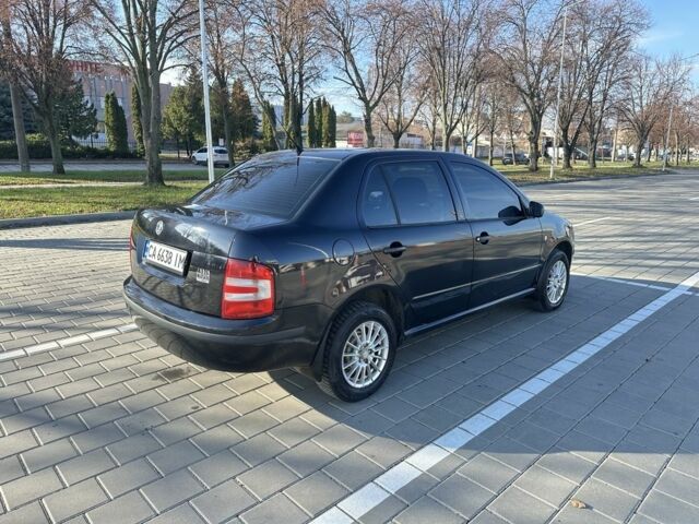 Черный Шкода Фабия, объемом двигателя 1.2 л и пробегом 285 тыс. км за 4200 $, фото 1 на Automoto.ua