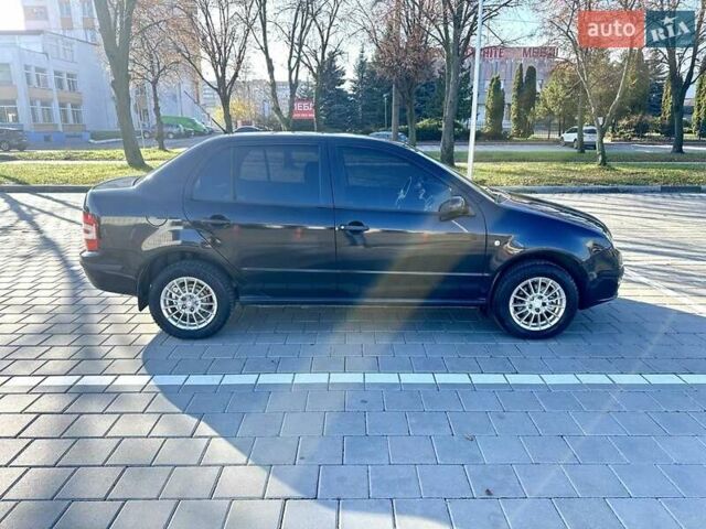 Чорний Шкода Фабія, об'ємом двигуна 1.2 л та пробігом 285 тис. км за 4200 $, фото 1 на Automoto.ua