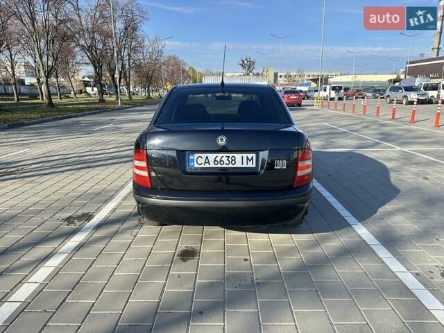 Чорний Шкода Фабія, об'ємом двигуна 1.2 л та пробігом 285 тис. км за 4200 $, фото 6 на Automoto.ua