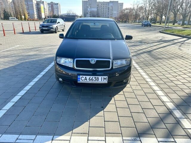 Черный Шкода Фабия, объемом двигателя 1.2 л и пробегом 285 тыс. км за 4200 $, фото 3 на Automoto.ua