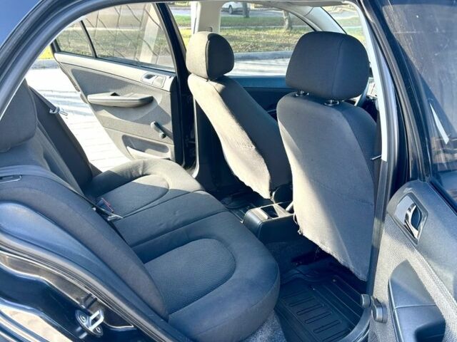 Черный Шкода Фабия, объемом двигателя 1.2 л и пробегом 285 тыс. км за 4200 $, фото 13 на Automoto.ua