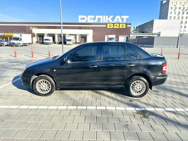 Черный Шкода Фабия, объемом двигателя 1.2 л и пробегом 285 тыс. км за 4200 $, фото 5 на Automoto.ua