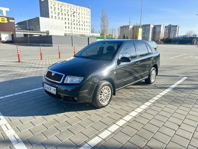 Черный Шкода Фабия, объемом двигателя 1.2 л и пробегом 285 тыс. км за 4200 $, фото 4 на Automoto.ua