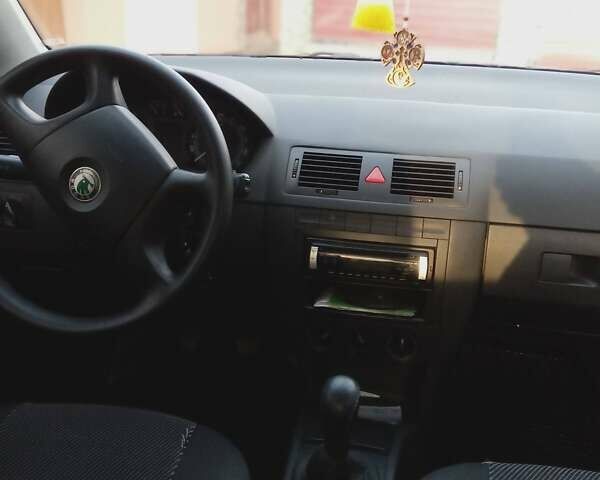 Черный Шкода Фабия, объемом двигателя 1.2 л и пробегом 112 тыс. км за 3600 $, фото 5 на Automoto.ua