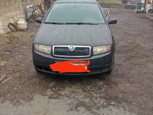 Черный Шкода Фабия, объемом двигателя 1.4 л и пробегом 162 тыс. км за 4000 $, фото 1 на Automoto.ua