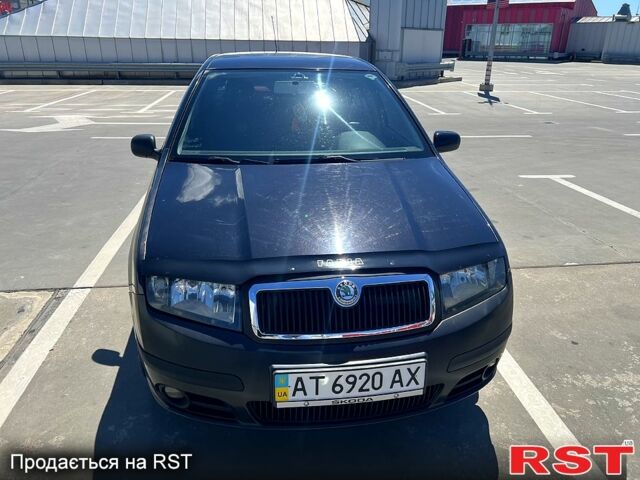 Черный Шкода Фабия, объемом двигателя 1.4 л и пробегом 120 тыс. км за 4000 $, фото 1 на Automoto.ua