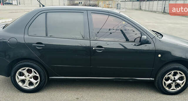 Чорний Шкода Фабія, об'ємом двигуна 1.2 л та пробігом 246 тис. км за 3100 $, фото 2 на Automoto.ua