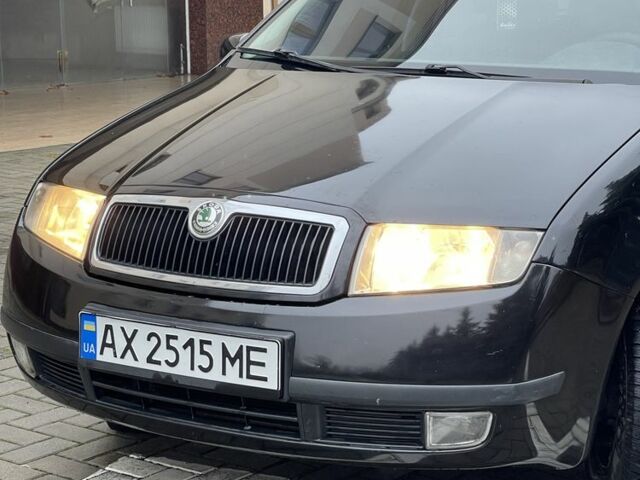 Черный Шкода Фабия, объемом двигателя 1.4 л и пробегом 289 тыс. км за 3470 $, фото 11 на Automoto.ua