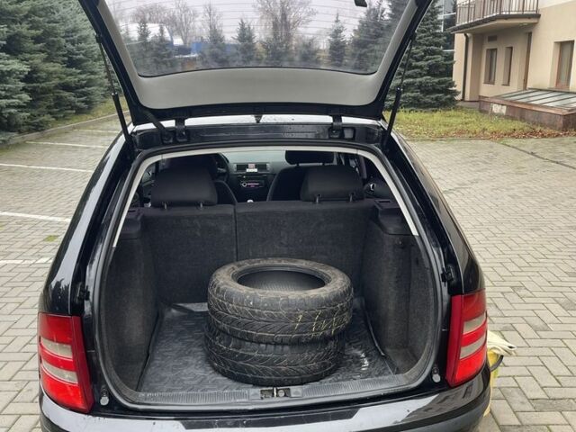 Черный Шкода Фабия, объемом двигателя 1.4 л и пробегом 289 тыс. км за 3470 $, фото 15 на Automoto.ua