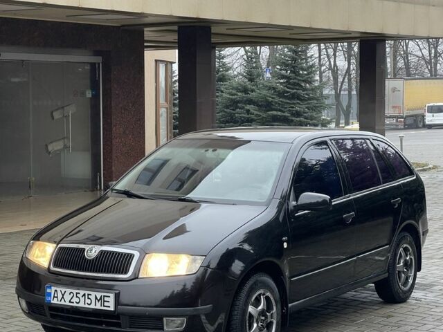 Черный Шкода Фабия, объемом двигателя 1.4 л и пробегом 289 тыс. км за 3470 $, фото 1 на Automoto.ua