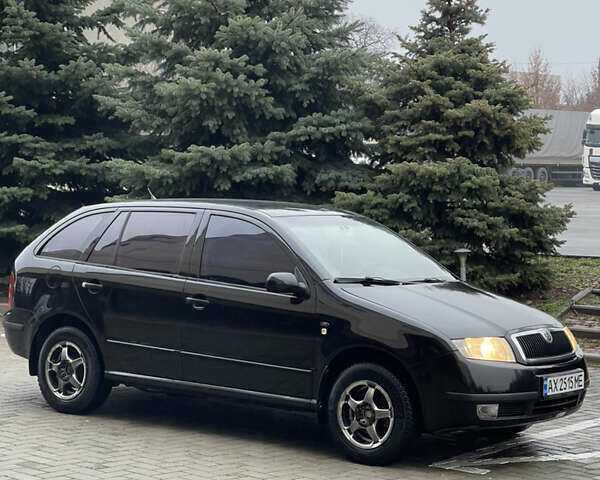 Чорний Шкода Фабія, об'ємом двигуна 1.4 л та пробігом 289 тис. км за 3470 $, фото 4 на Automoto.ua