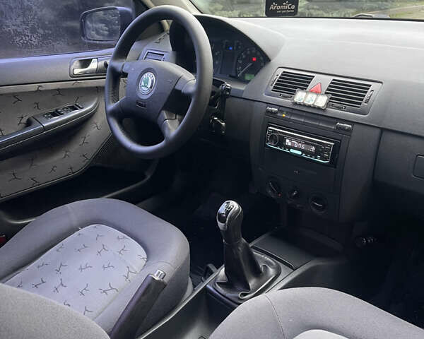 Чорний Шкода Фабія, об'ємом двигуна 1.4 л та пробігом 289 тис. км за 3470 $, фото 51 на Automoto.ua