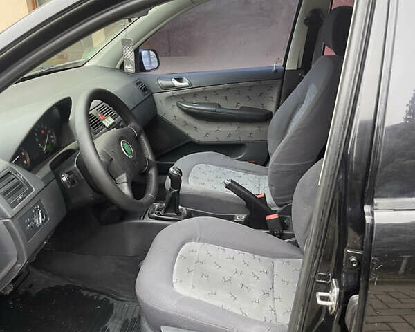 Чорний Шкода Фабія, об'ємом двигуна 1.4 л та пробігом 289 тис. км за 3470 $, фото 79 на Automoto.ua