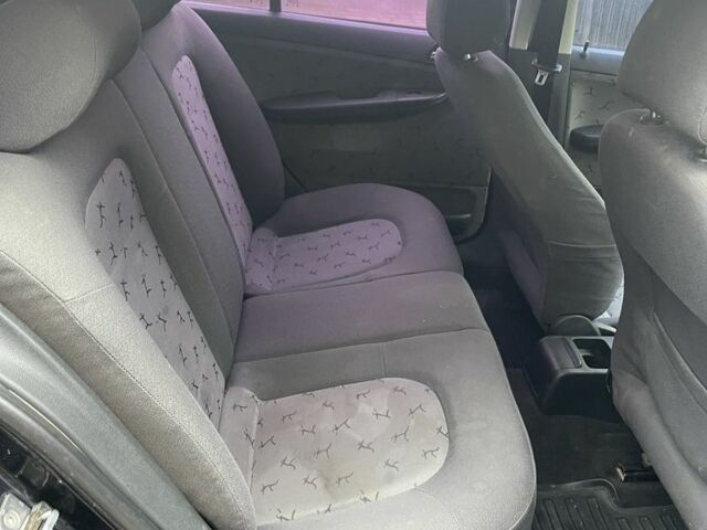 Черный Шкода Фабия, объемом двигателя 1.4 л и пробегом 289 тыс. км за 3470 $, фото 16 на Automoto.ua