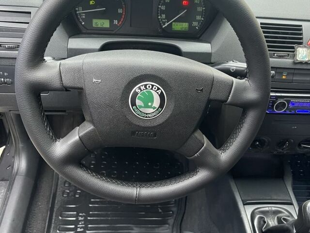 Черный Шкода Фабия, объемом двигателя 1.4 л и пробегом 289 тыс. км за 3470 $, фото 19 на Automoto.ua