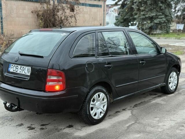 Черный Шкода Фабия, объемом двигателя 1.9 л и пробегом 200 тыс. км за 1550 $, фото 2 на Automoto.ua