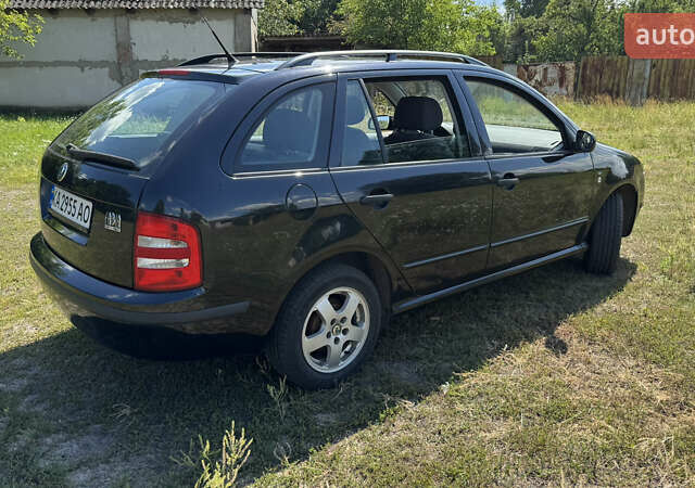 Черный Шкода Фабия, объемом двигателя 1.4 л и пробегом 214 тыс. км за 3700 $, фото 3 на Automoto.ua