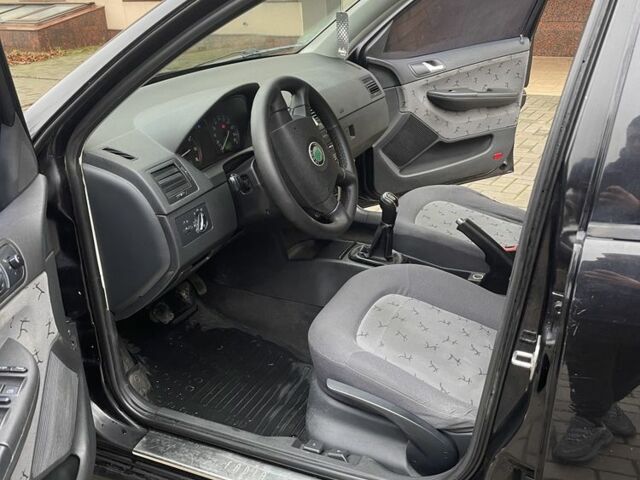 Черный Шкода Фабия, объемом двигателя 1.4 л и пробегом 289 тыс. км за 3470 $, фото 13 на Automoto.ua