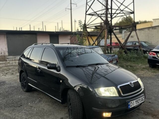Черный Шкода Фабия, объемом двигателя 1.4 л и пробегом 290 тыс. км за 4400 $, фото 2 на Automoto.ua