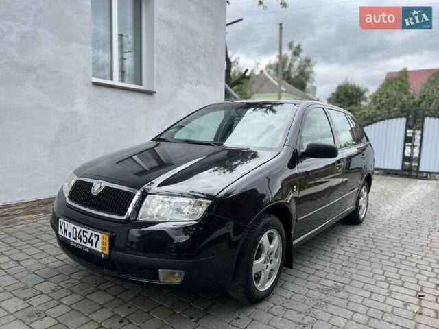 Черный Шкода Фабия, объемом двигателя 1.39 л и пробегом 174 тыс. км за 4999 $, фото 3 на Automoto.ua