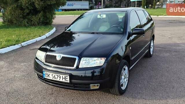 Черный Шкода Фабия, объемом двигателя 1.39 л и пробегом 189 тыс. км за 4200 $, фото 1 на Automoto.ua