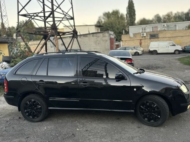 Черный Шкода Фабия, объемом двигателя 1.4 л и пробегом 290 тыс. км за 4400 $, фото 3 на Automoto.ua