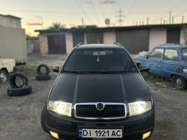 Черный Шкода Фабия, объемом двигателя 1.4 л и пробегом 290 тыс. км за 4400 $, фото 1 на Automoto.ua