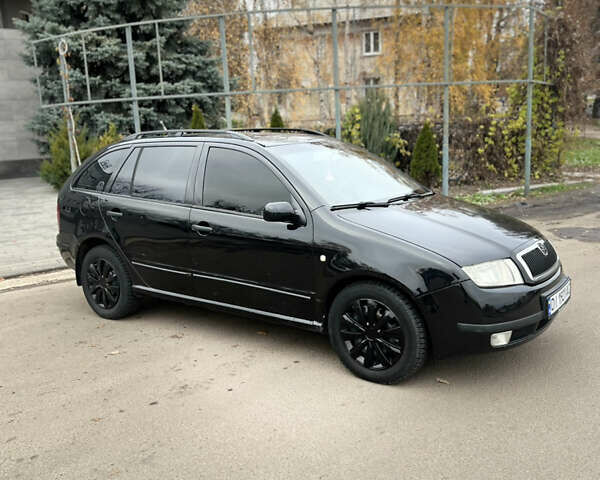 Чорний Шкода Фабія, об'ємом двигуна 1.4 л та пробігом 295 тис. км за 4150 $, фото 8 на Automoto.ua