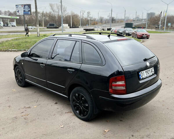 Чорний Шкода Фабія, об'ємом двигуна 1.4 л та пробігом 295 тис. км за 4150 $, фото 4 на Automoto.ua