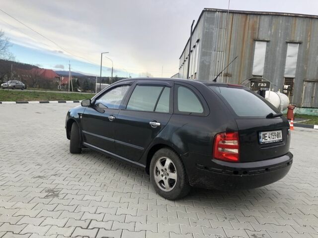 Черный Шкода Фабия, объемом двигателя 1.9 л и пробегом 362 тыс. км за 2550 $, фото 2 на Automoto.ua