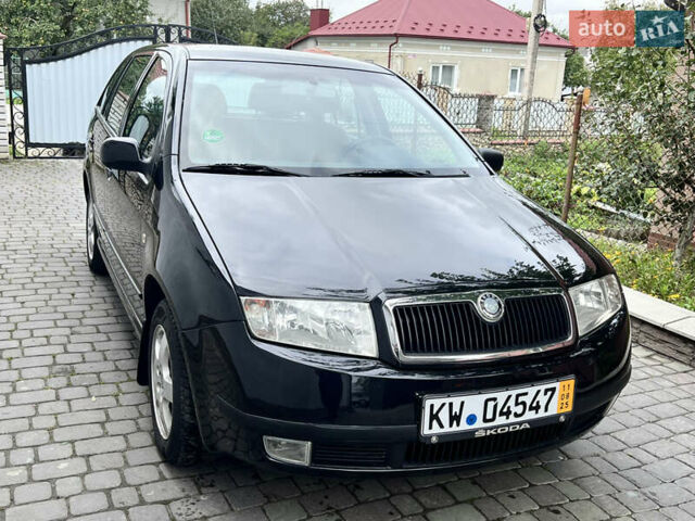 Черный Шкода Фабия, объемом двигателя 1.39 л и пробегом 174 тыс. км за 4999 $, фото 2 на Automoto.ua