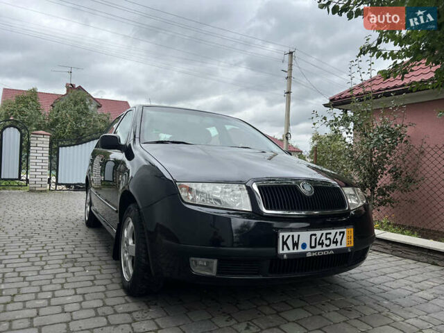 Черный Шкода Фабия, объемом двигателя 1.39 л и пробегом 174 тыс. км за 4999 $, фото 1 на Automoto.ua