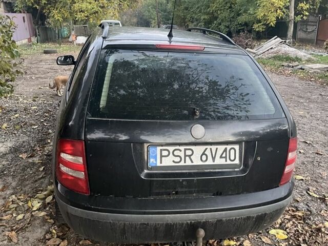 Черный Шкода Фабия, объемом двигателя 2 л и пробегом 320 тыс. км за 1788 $, фото 1 на Automoto.ua