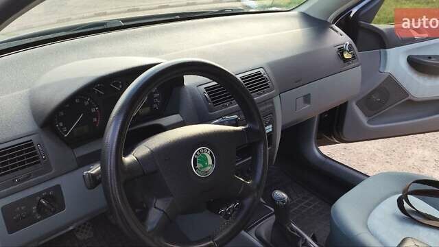 Черный Шкода Фабия, объемом двигателя 1.39 л и пробегом 189 тыс. км за 4200 $, фото 11 на Automoto.ua