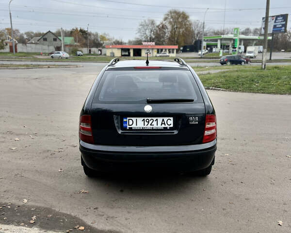 Чорний Шкода Фабія, об'ємом двигуна 1.4 л та пробігом 295 тис. км за 4150 $, фото 5 на Automoto.ua