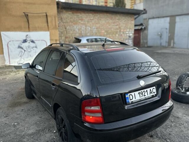 Черный Шкода Фабия, объемом двигателя 1.4 л и пробегом 290 тыс. км за 4400 $, фото 6 на Automoto.ua