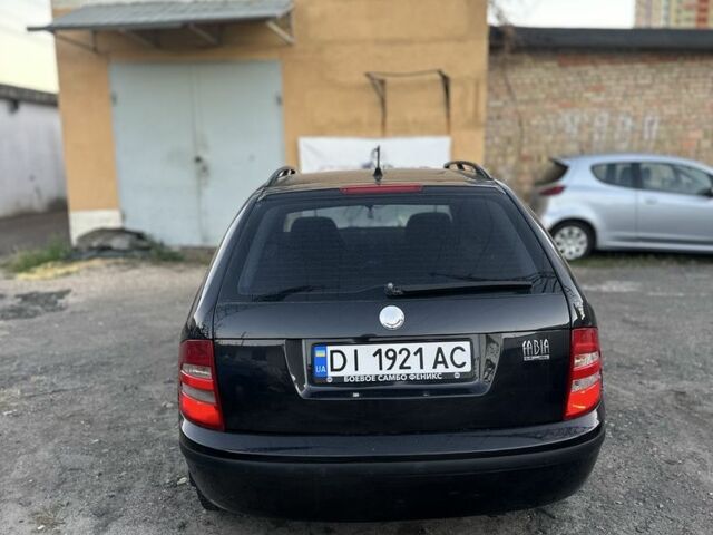 Черный Шкода Фабия, объемом двигателя 1.4 л и пробегом 290 тыс. км за 4400 $, фото 5 на Automoto.ua