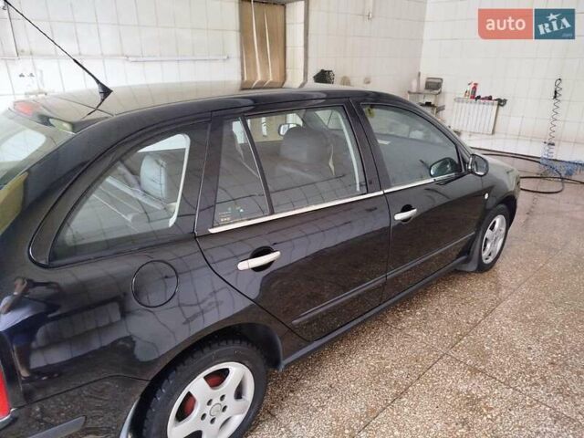 Черный Шкода Фабия, объемом двигателя 1.4 л и пробегом 213 тыс. км за 3999 $, фото 7 на Automoto.ua